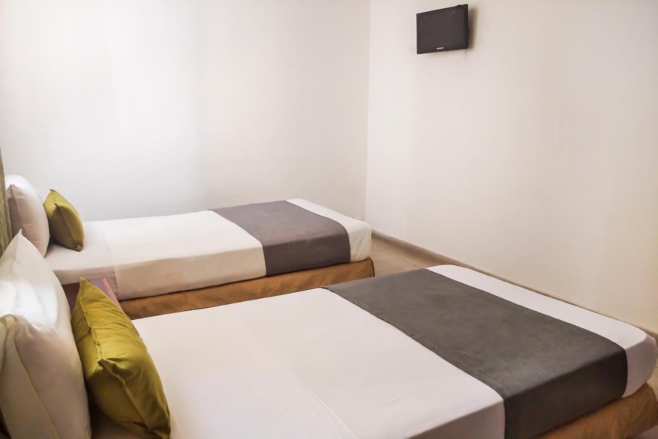 Ayenda 1622 Charmin Hotel ซันตามาร์ตา ภายนอก รูปภาพ